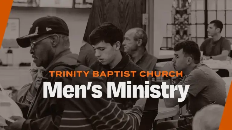 Men attentively listening during a Men's Ministry event at Trinity Baptist Church.