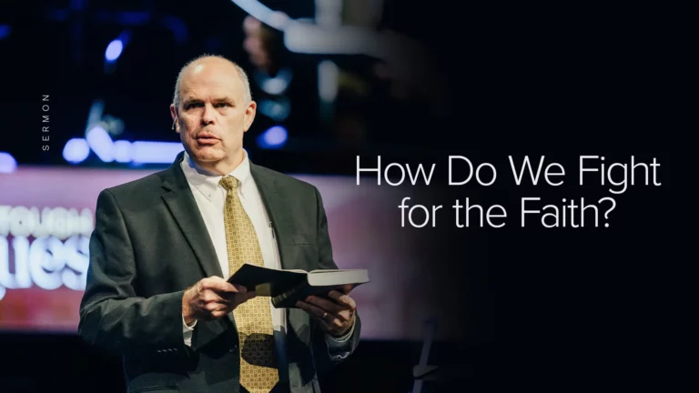 Pastor David Rose preaching with Bible in hand during sermon on faith.